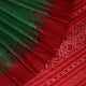 Close-up of green and red tussar silk saree fabric texture