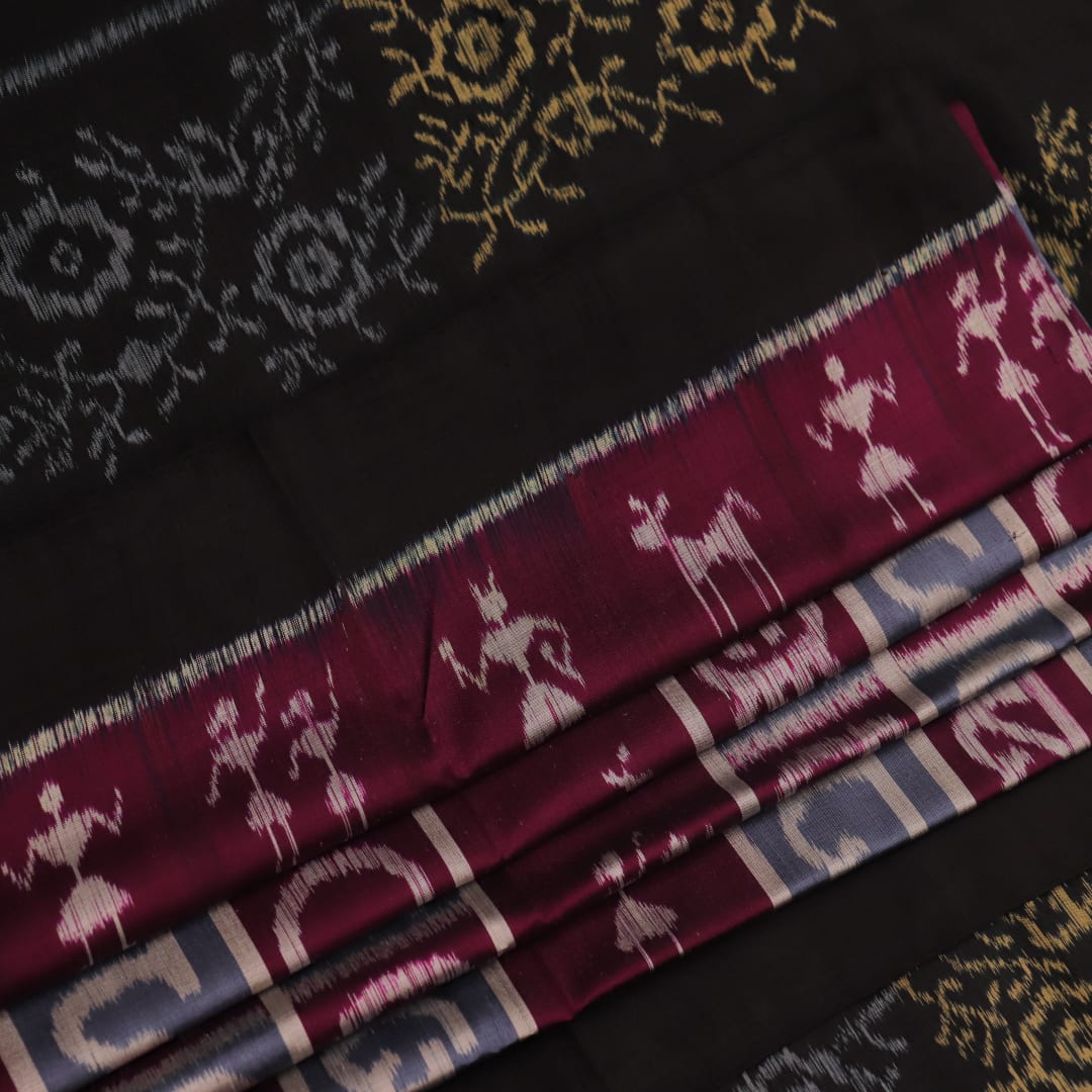 Full-length view of a maroon silk Khandua saree featuring intricate black motifs.