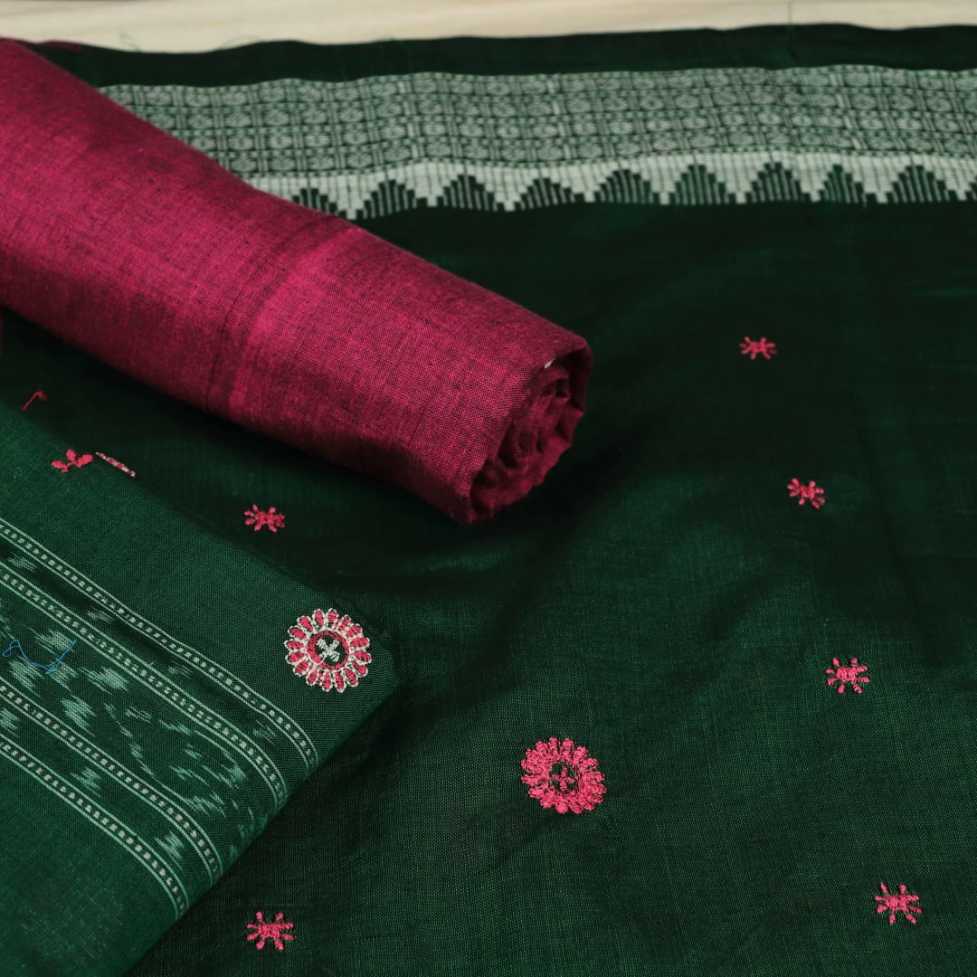 Close-up of blouse piece with Sambalpuri motifs in green and magenta cotton