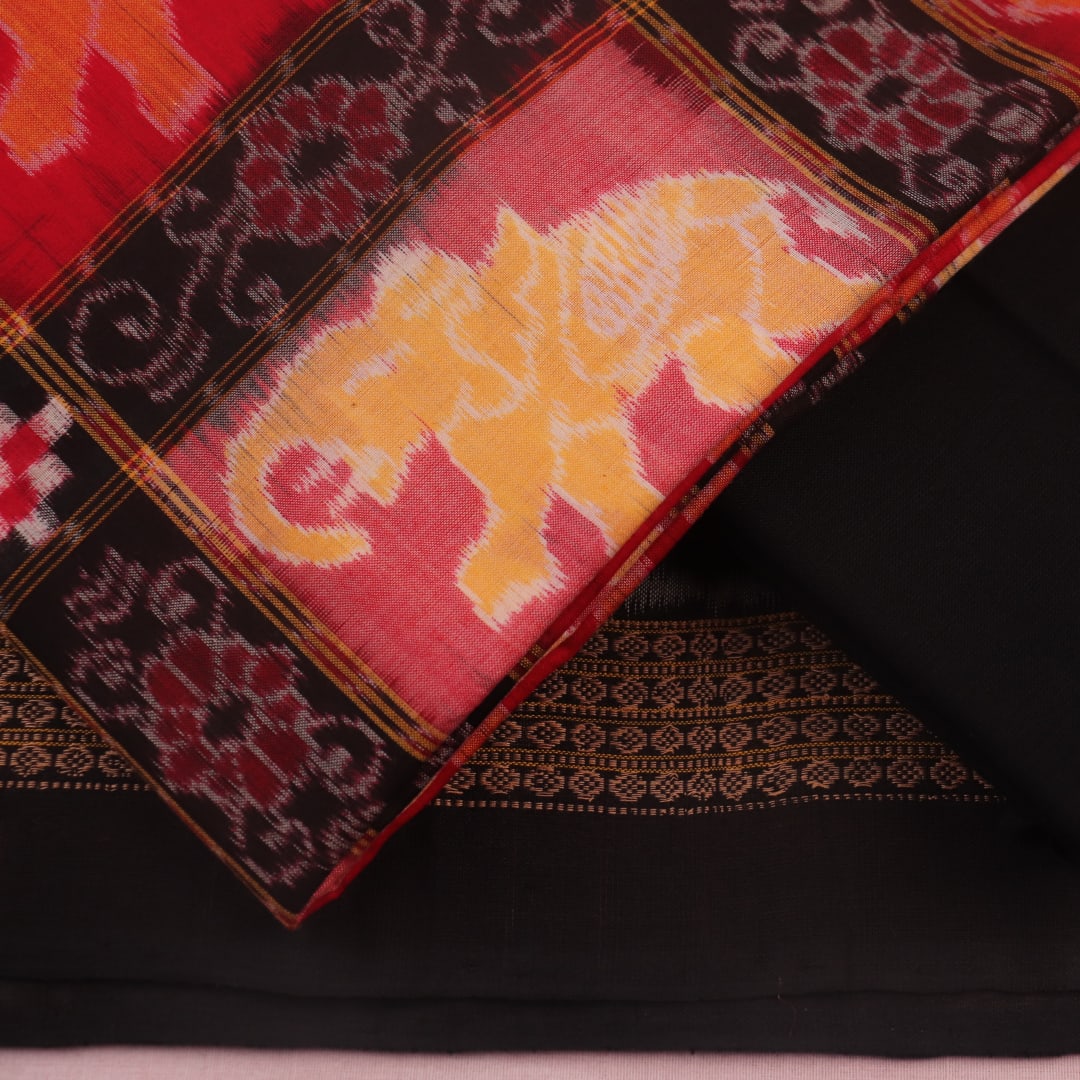 Red and black Sambalpuri Pasapalli cotton dress material blouse piece detail.
