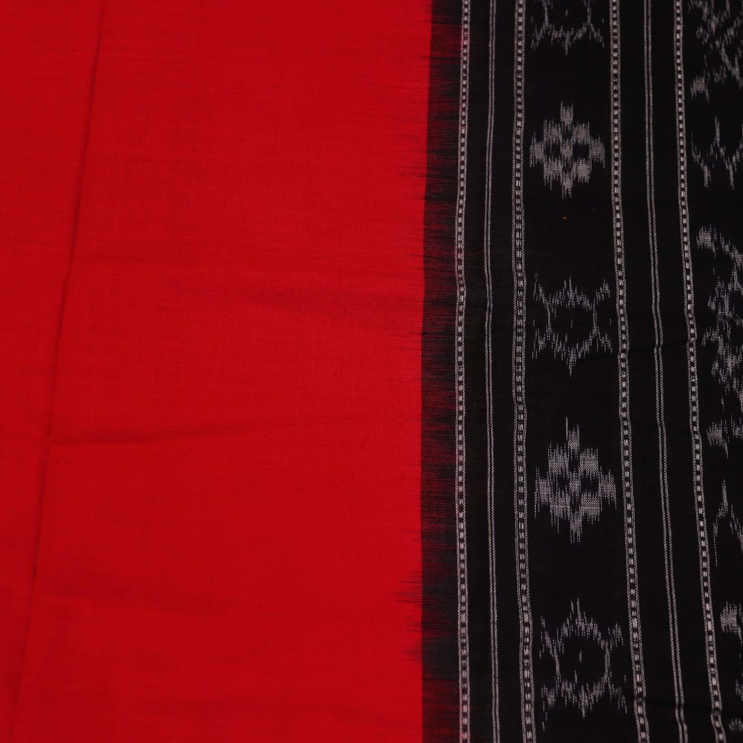 Sambalpuri Cotton Dupatta in Red and Black, with a plain pattern, draped for styling.