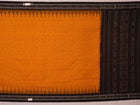 Styling view of a plain yellow and black Sambalpuri cotton saree, highlighting its elegant drape.