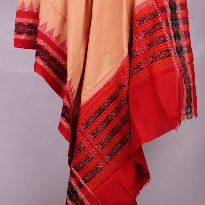 Cream-colored cotton Sambalpuri dupatta with red plain body and contrasting border, elegantly draped