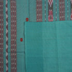Full flat layout view of the red and green Sambalpuri cotton saree showcasing the butta pattern and borders.