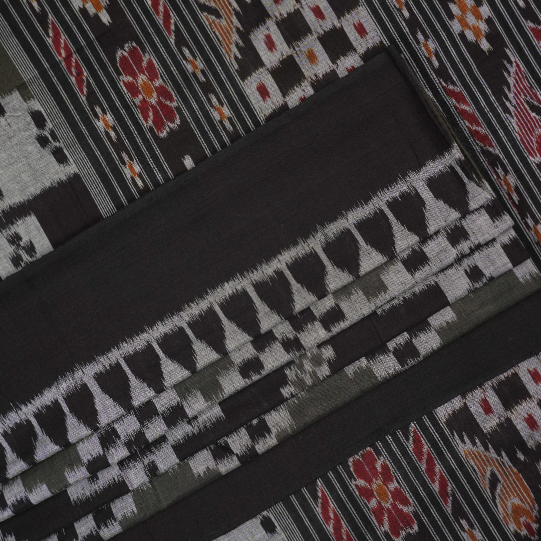 Model wearing a stylish green and black Sambalpuri cotton saree with traditional handloom woven motifs