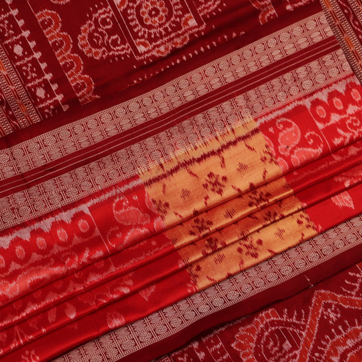 Close-up showcasing the fine texture of the silk material used in the Sambalpuri saree.