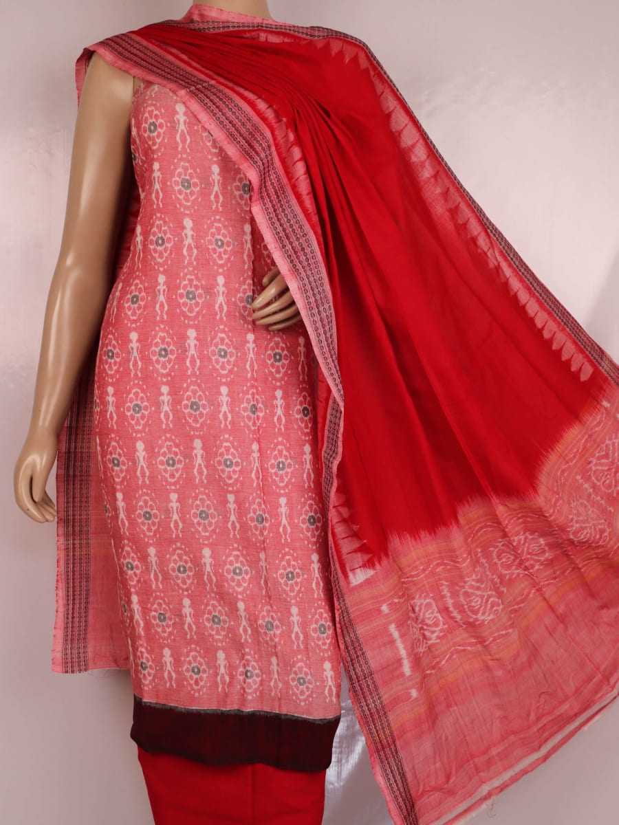 Close-up of red and pink cotton Sambalpuri dress material with intricate motifs.