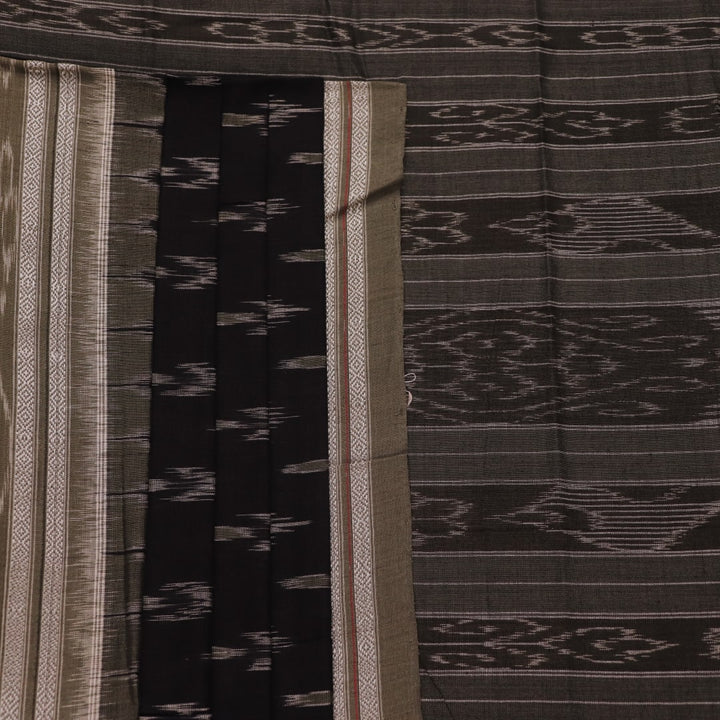 Saree styled; black Sambalpuri cotton saree with grey motifs showcased in a draped presentation.