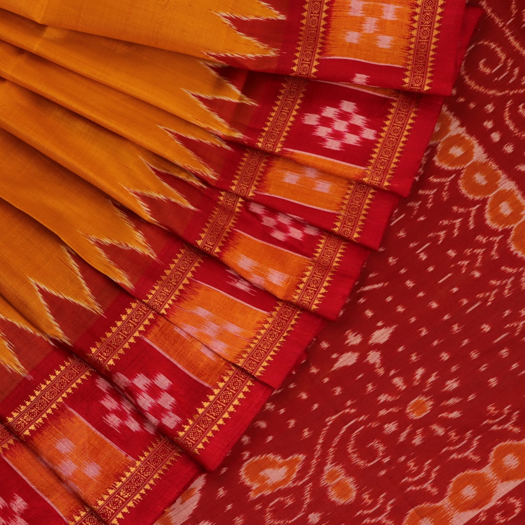 Styled drape view of yellow silk Khandua saree with red butta embroidery