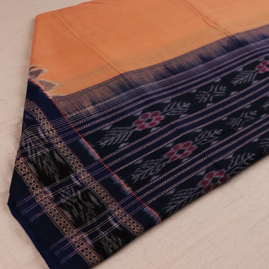 Styling view of a cream and black Sambalpuri cotton dupatta with plain pattern