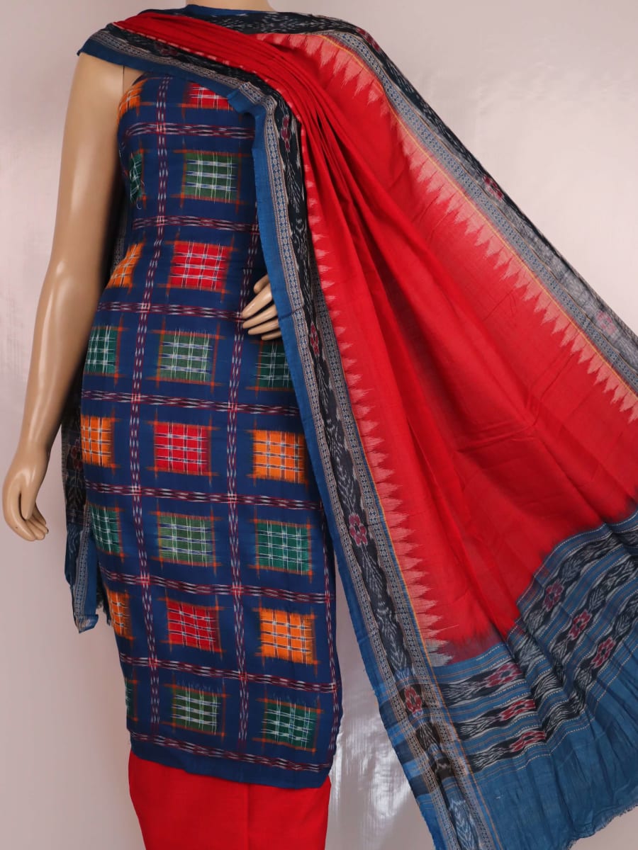 Close-up of off-white blouse piece with red motifs, paired with a Blue Sambalpuri cotton dress material.