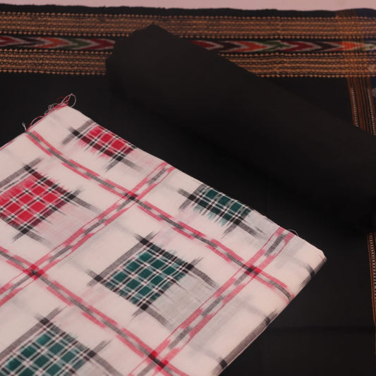 Detail of the motif-patterned blouse piece from a white and black Sambalpuri cotton dress material.