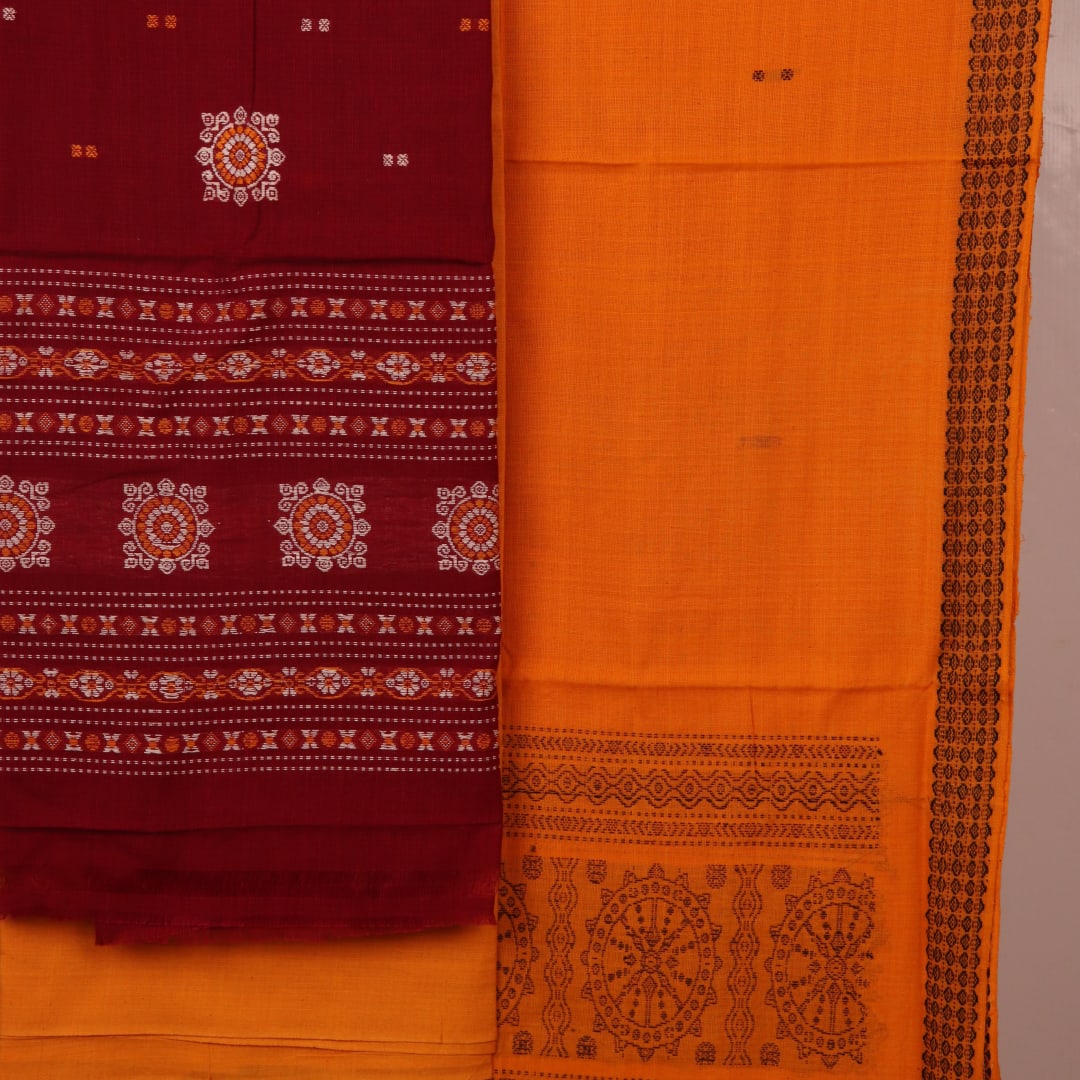 Bomkai cotton dress material blouse piece in maroon, featuring a subtle butta pattern.