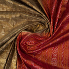Ultra close-up of Sambalpuri silk saree fabric, showing luxurious texture and tissue motif weave.