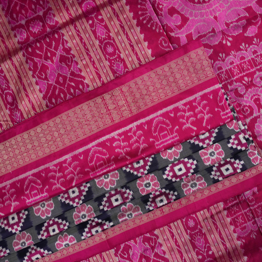 Detail of the luxurious silk texture and exquisite handloom weave of the Multi-color Pink Sambalpuri Saree.