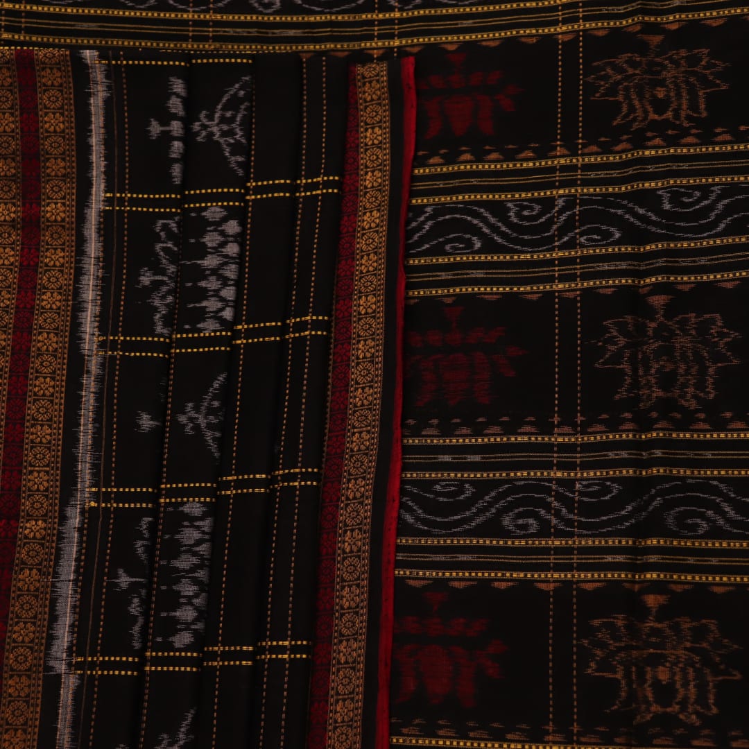 Full view of a black and black cotton Sambalpuri saree with intricate motif patterns.