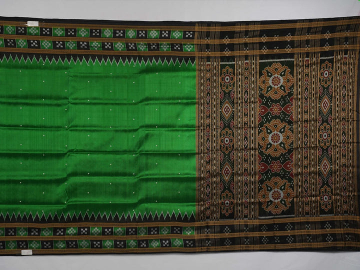 Model draped in a green and black Khandua silk saree with butta work, showcasing elegant ethnic styling.