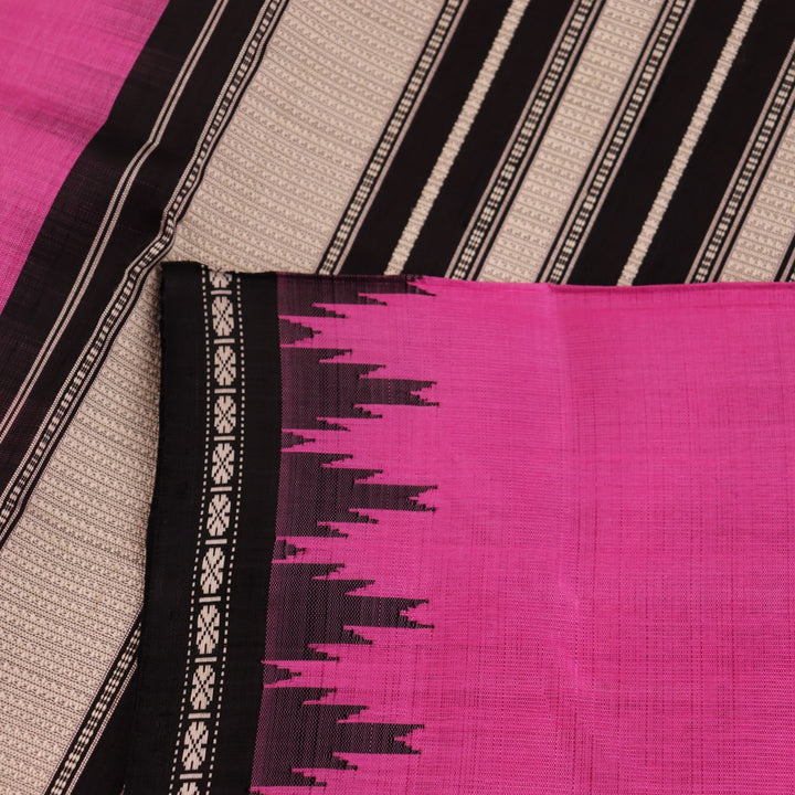 Close-up showcasing the intricate silk fabric texture of a pink and black Berhampuri silk saree with a butta pattern