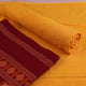 Maroon & yellow Bomkai cotton dress material: close-up of matching handloom blouse piece fabric.