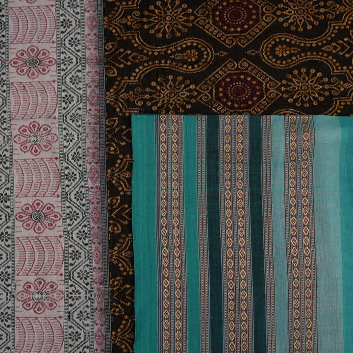 Full view of the black and green Bomkai cotton handloom saree showing the complete body, pallu, and border.