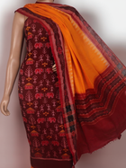 Detail of Sambalpuri cotton dress material blouse piece, maroon and yellow motifs.