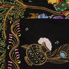 Close-up of black silk Patachitra saree fabric, showcasing hand-painted texture and detail.