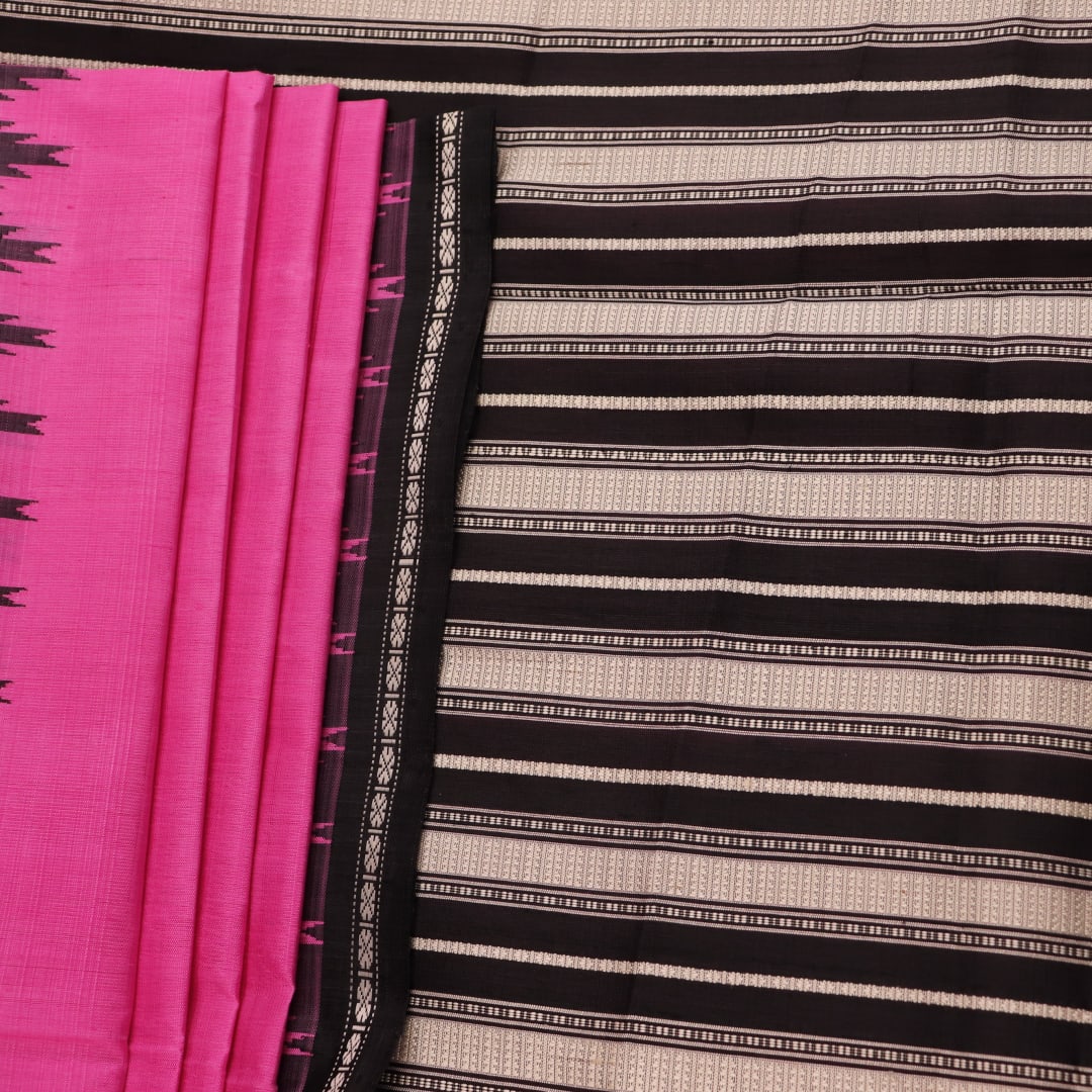 Close-up showcasing the intricate silk fabric texture of a pink and black Berhampuri silk saree with a butta pattern