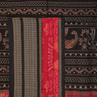 Flat layout view of the red and black Sambalpuri cotton saree showing the body, border, and pallu.
