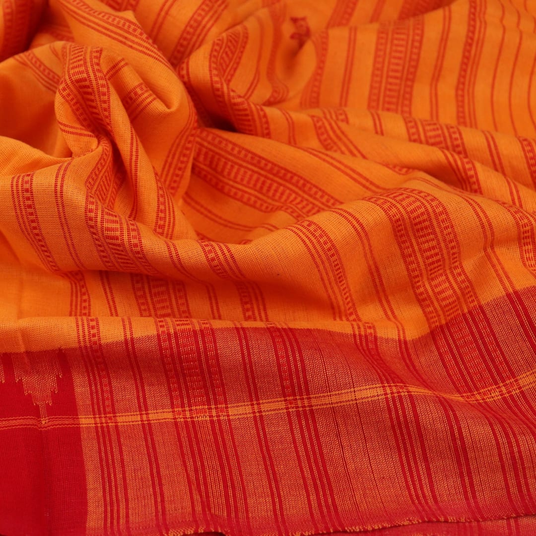 Sambalpuri Cotton Dupatta in Yellow and Red with intricate Butta pattern, styled and draped in an elegant manner