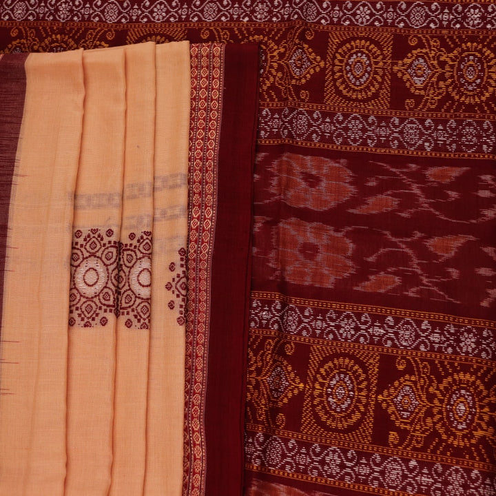 Full view of a cream cotton Bomkai saree with a maroon butta pattern.