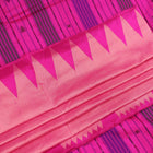 Close-up of plain peach and pink Sambalpuri silk saree fabric texture.