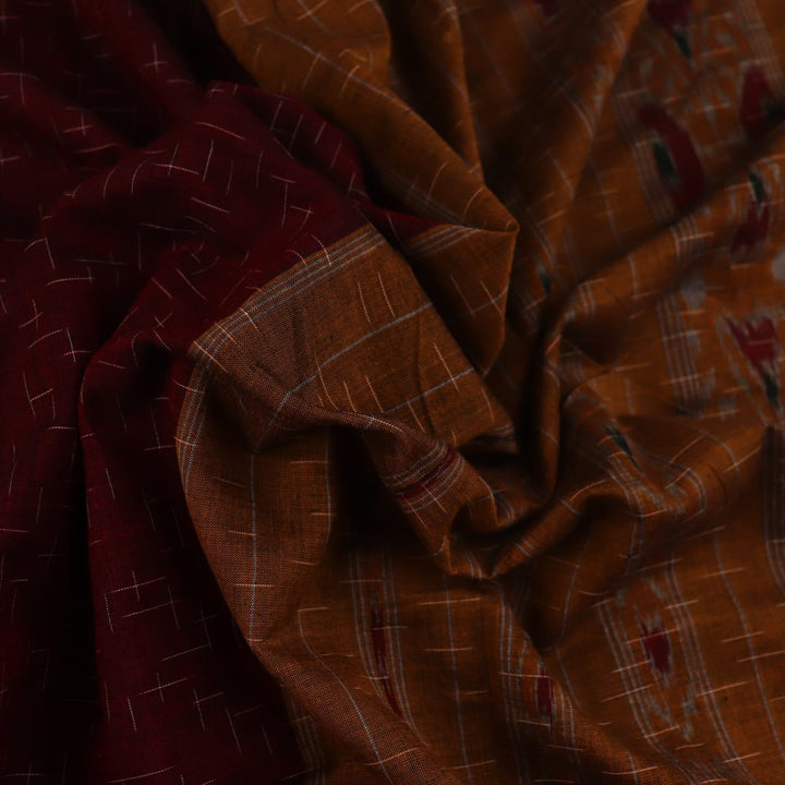 Styling view of a plain maroon and yellow Sambalpuri cotton saree.
