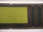 Full flat layout of the green and black Sambalpuri cotton saree with detailed motifs and pallu design