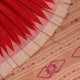 Close-up of plain red and off-white Tussar silk saree fabric texture.