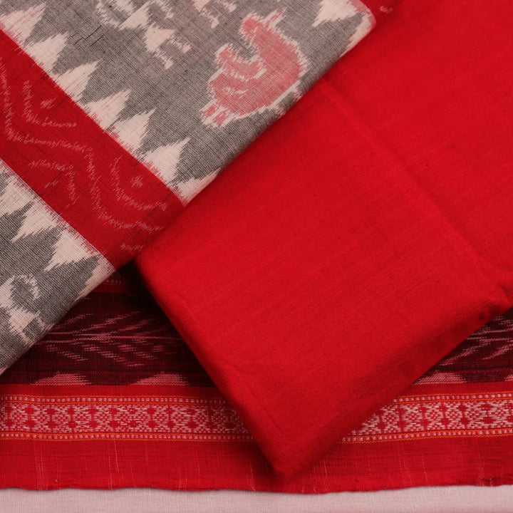 Close-up view of blouse piece with Sambalpuri motifs in grey and red cotton