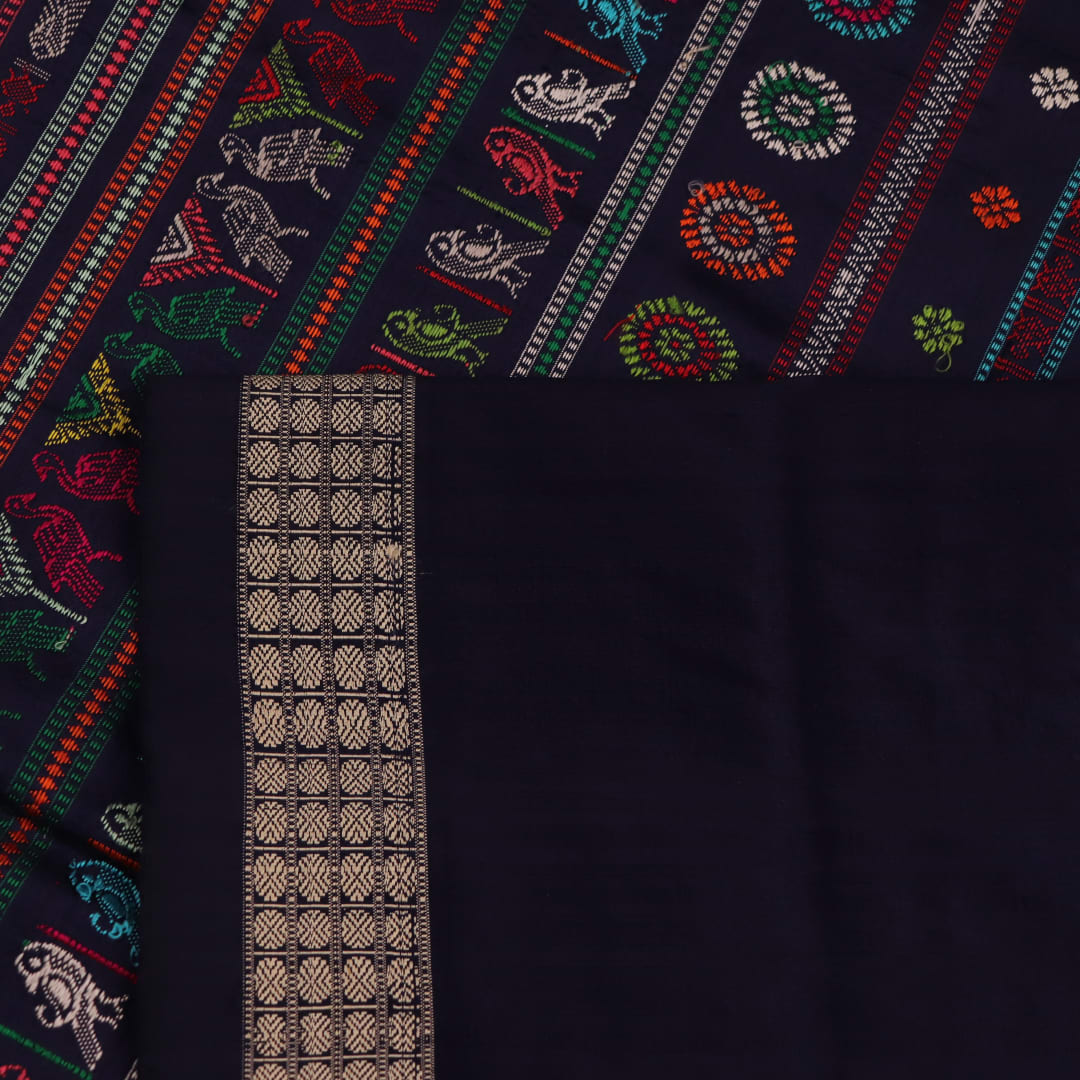 Close-up of light and dark blue silk fabric with intricate butta pattern woven in