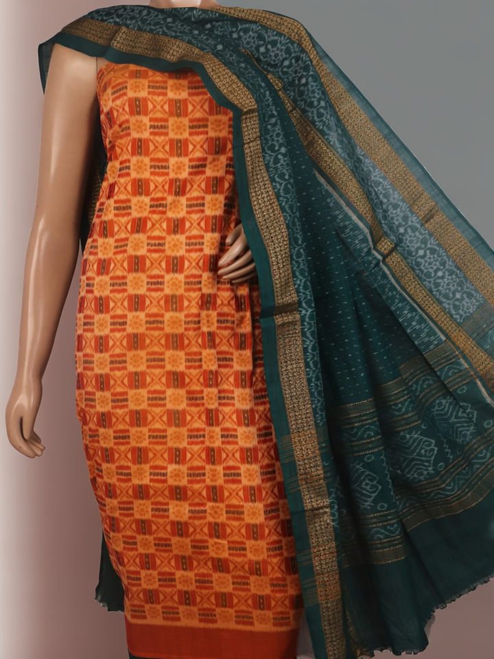 Blouse piece detail of the rust and green Sambalpuri cotton dress material with motifs.