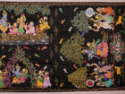 Close-up of black silk Patachitra saree fabric, showcasing hand-painted texture and detail.