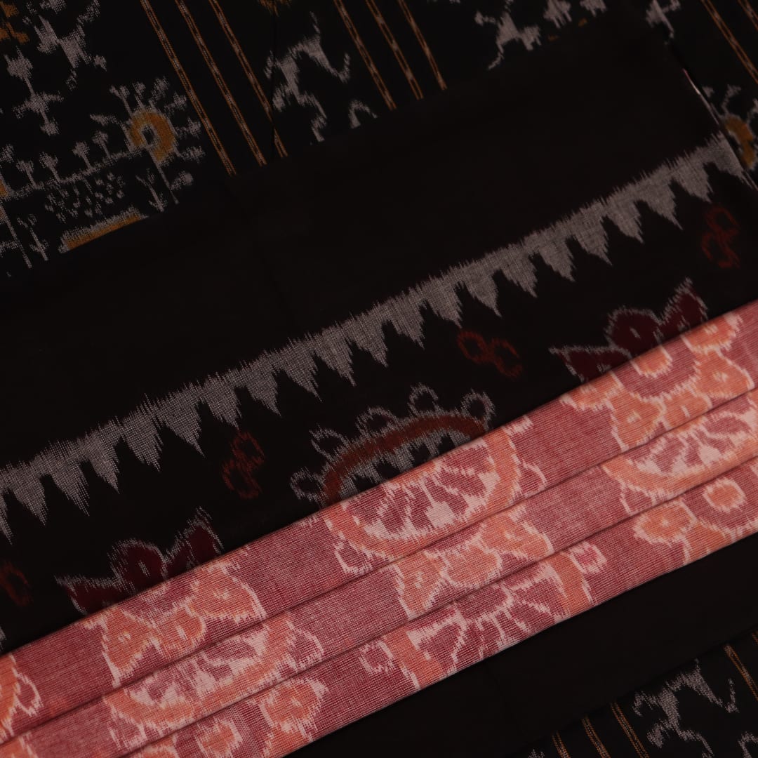 Full view of a peach-colored Sambalpuri cotton saree with black motifs.