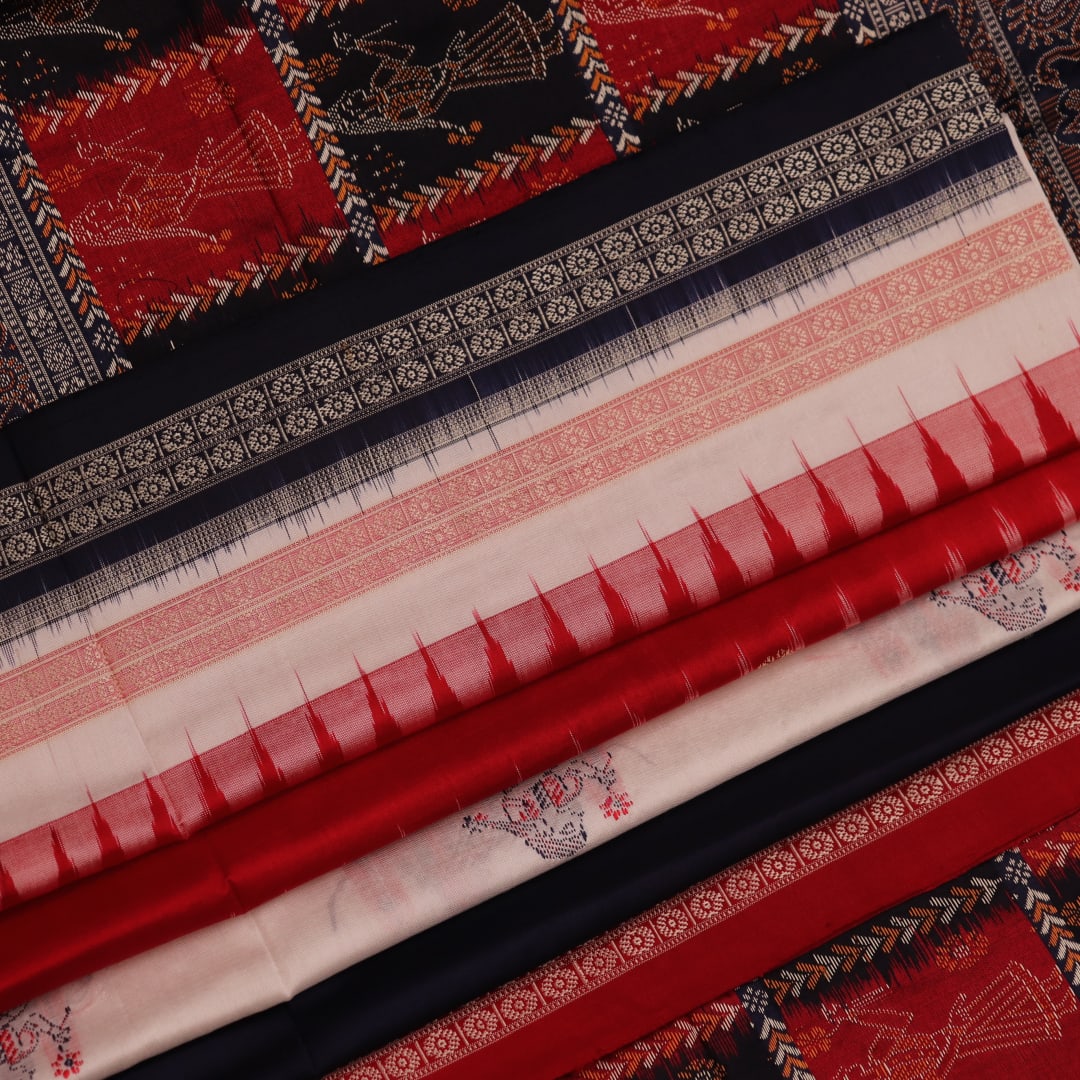 Image 7: Close-up view of the intricate silk fabric texture in white and red colors of a Bomkai saree