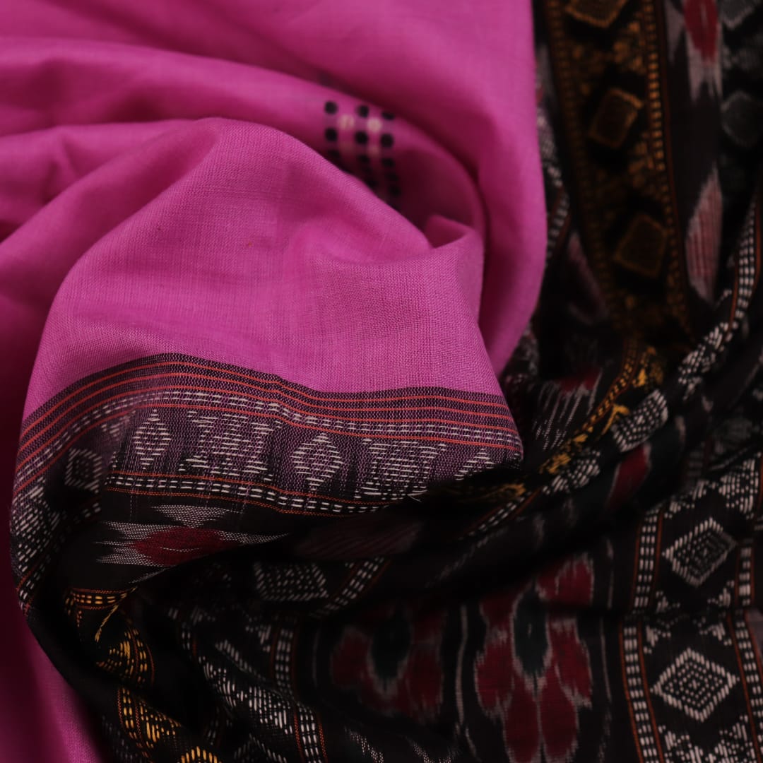 Full-length view of a pink Bomkai cotton saree featuring black butta patterns.