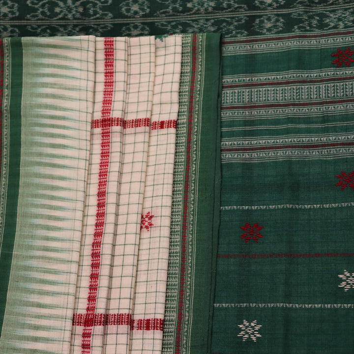 Full view of a white cotton Sambalpuri saree with green butta patterns.