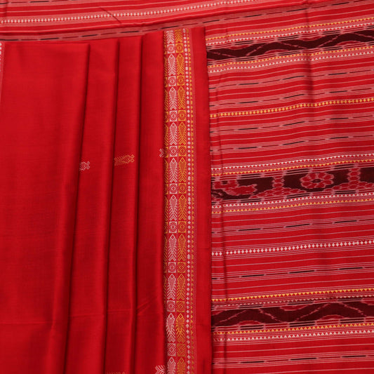 Close-up of the distinct handwoven texture of a red Sambalpuri silk saree with Butta pattern.