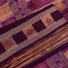 Close-up of the smooth, lustrous texture of multi-color and violet Bomkai silk saree, featuring butta weave.