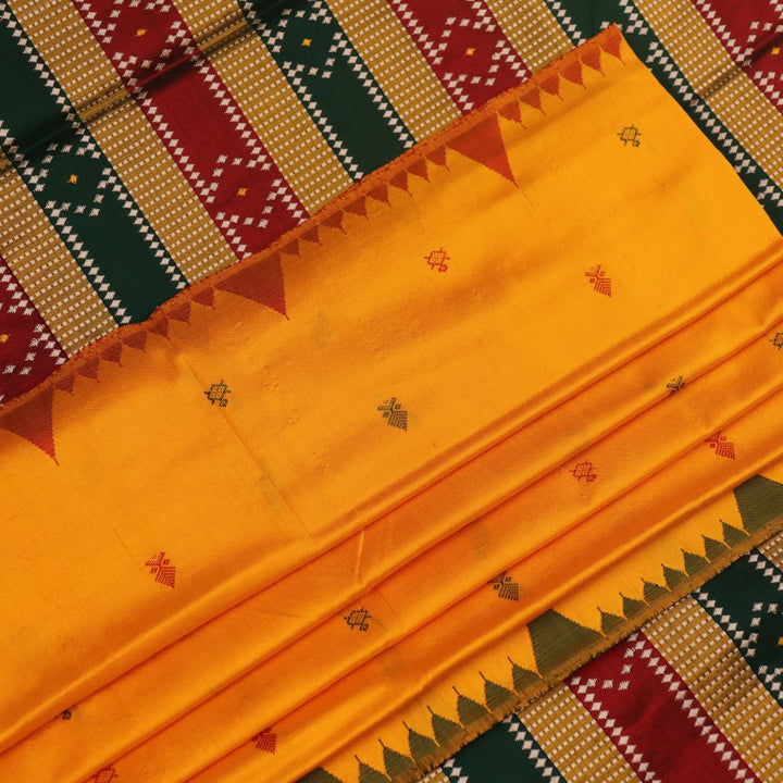Close-up of yellow & green Sambalpuri Silk Saree fabric texture, showing Butta pattern.