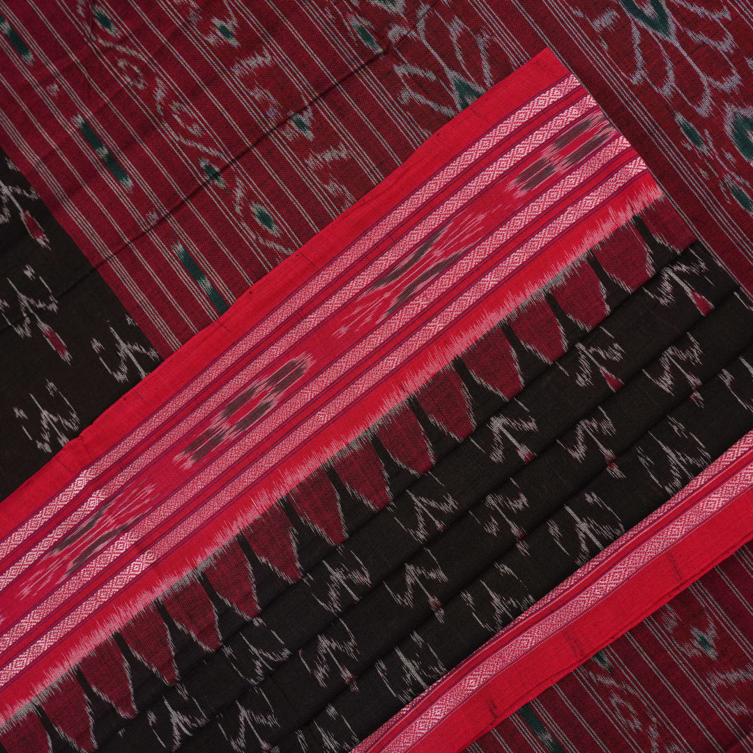 Model draped in a black and red Sambalpuri cotton saree showing traditional Odisha handloom styling.