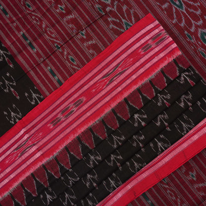 Model draped in a black and red Sambalpuri cotton saree showing traditional Odisha handloom styling.