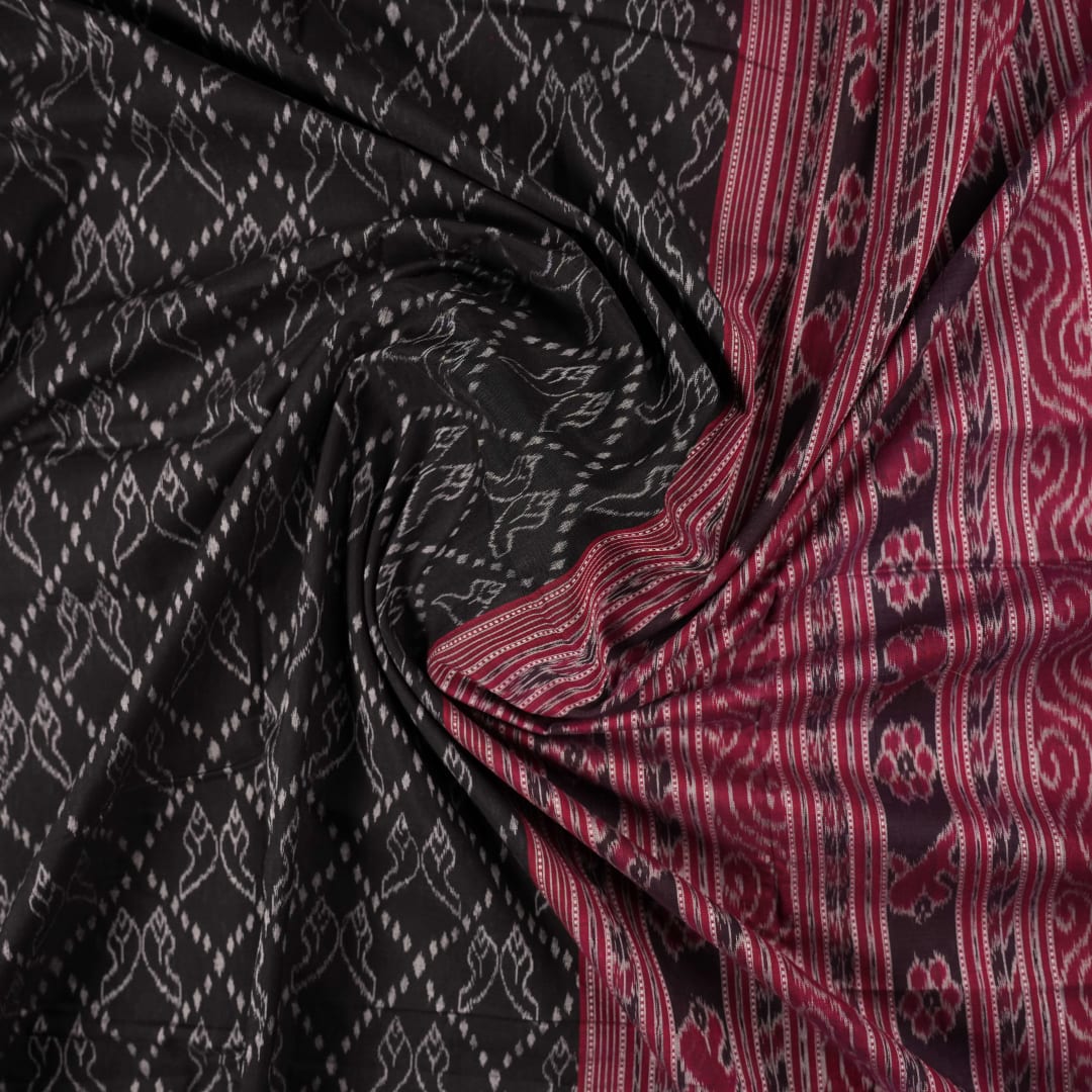 Full layout of black and maroon Sambalpuri cotton saree showing the body, pallu, and border design.