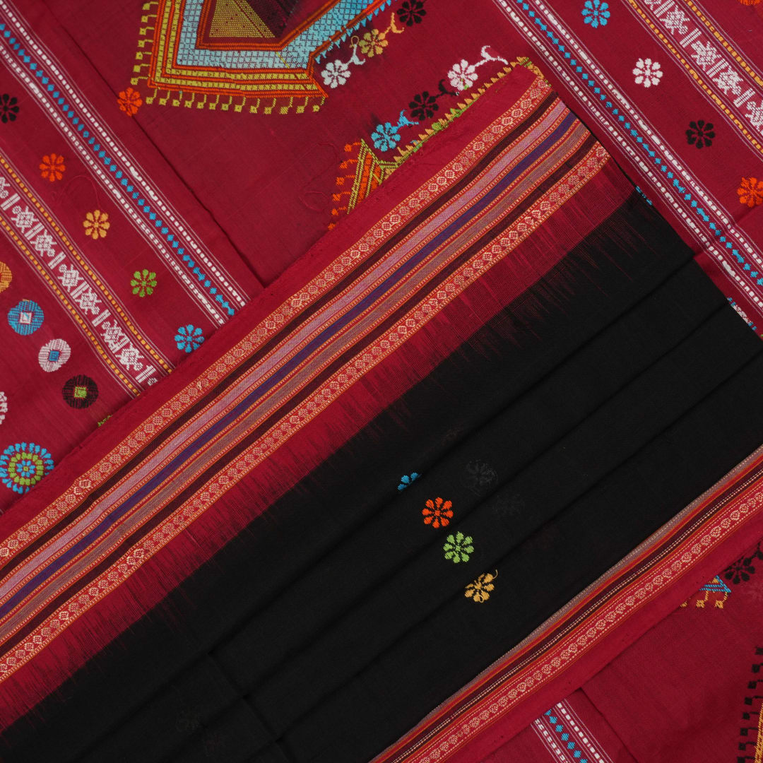 Full view of the black and red Dolabedi cotton saree laid out to show the complete pattern and pallu.