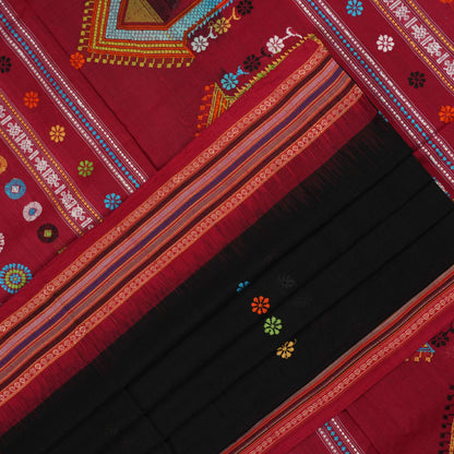 Full view of the black and red Dolabedi cotton saree laid out to show the complete pattern and pallu.